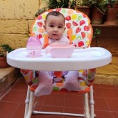 Our little Gozitan customer Cloe happy with her new Feed Me highchair by Red Kite